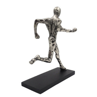 Futó szobrocska, fém figura gravírozással