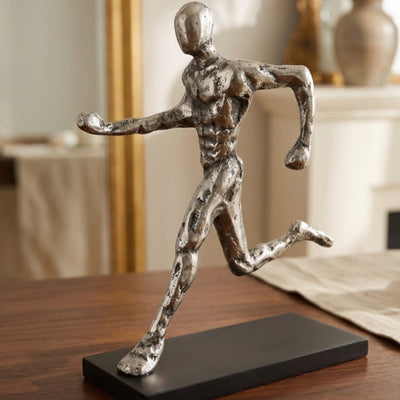 Futó szobrocska, fém figura gravírozással